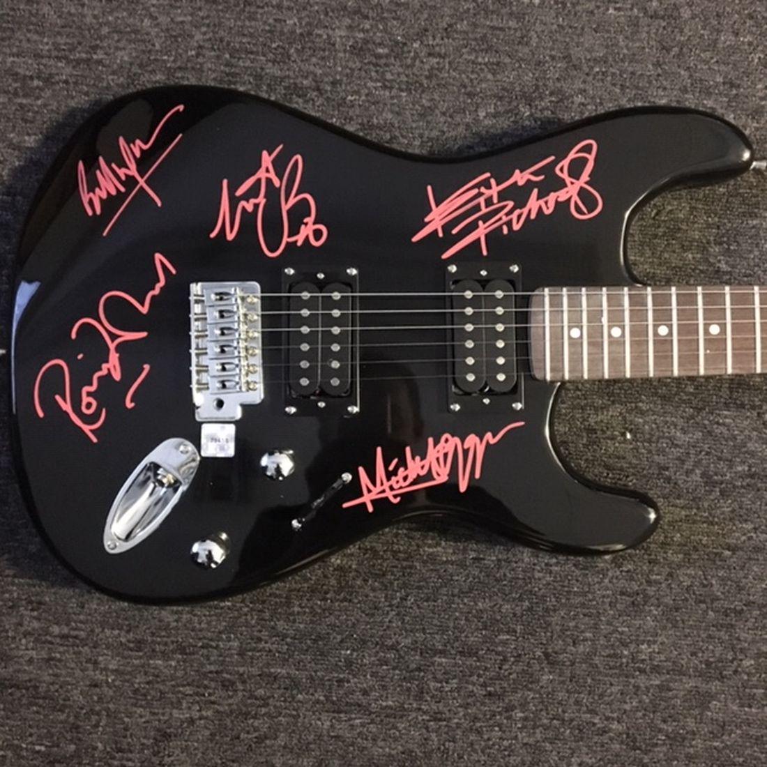 The Rolling Stones Signed Black Guitar (1 of 1)