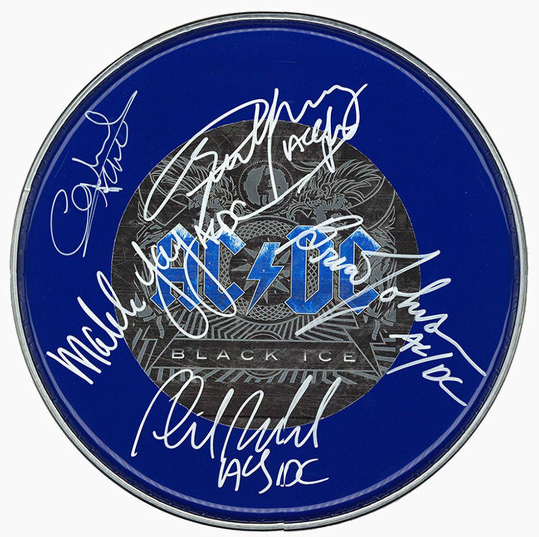 AC/DC Signed Drum Head: Signed by Brian Johnson, Angus Young, Malcolm Young, Cliff Williams, and Phil Rudd
