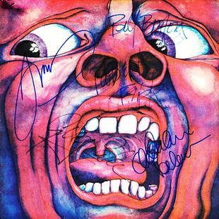 King Crimson "In the Court of the Crimson King" Signed: Signed by Ian McDonald, Robert Fripp, Greg Lake, Adrian Belew, and Bill Bruford