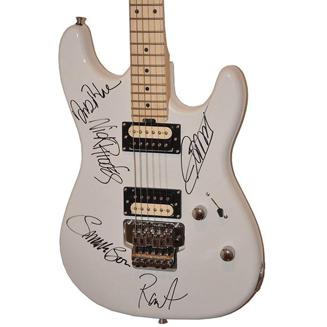 Duran Duran Signed Ivory White Electric Guitar: Signed by Simon LeBon, Nick Rhodes, John Taylor, Roger Taylor, and Andy Taylor