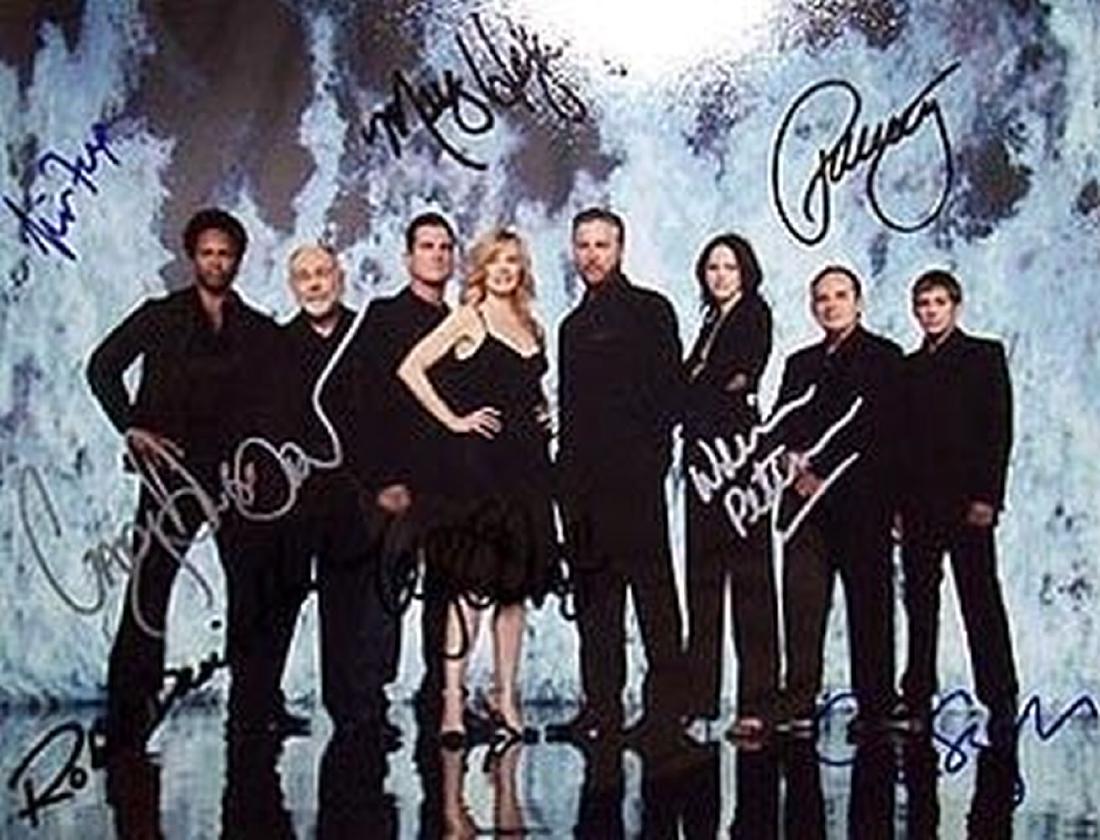 CSI Signed Photo: "CSI: Crime Scene Investigation" William Peterson, Jorja Fox, Eric Szmanda, George Eads, Paul Guilfoyle Marg Helgenberer and Gary Dourdan autographed 11x14 photo.