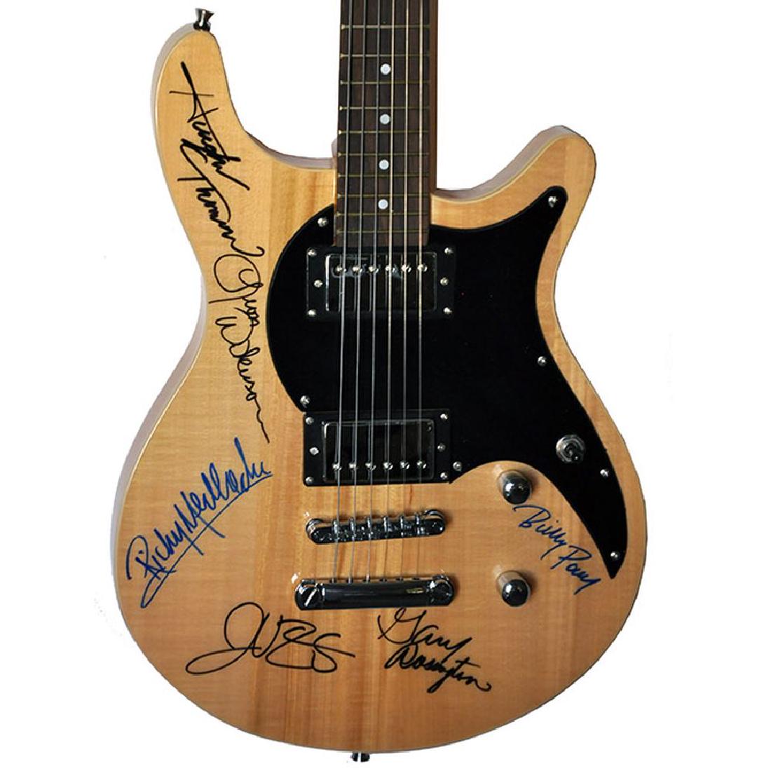 Lynyrd Skynyrd Signed Guitar: Signed by Johnny Van Zant, Leon Russell Wilkeson, Artimus Pyle, Randall Hall, Gary Rossington, Ed King, and Billy Powell All autographed items come with a Lifetime Certificate of Authenticity with num