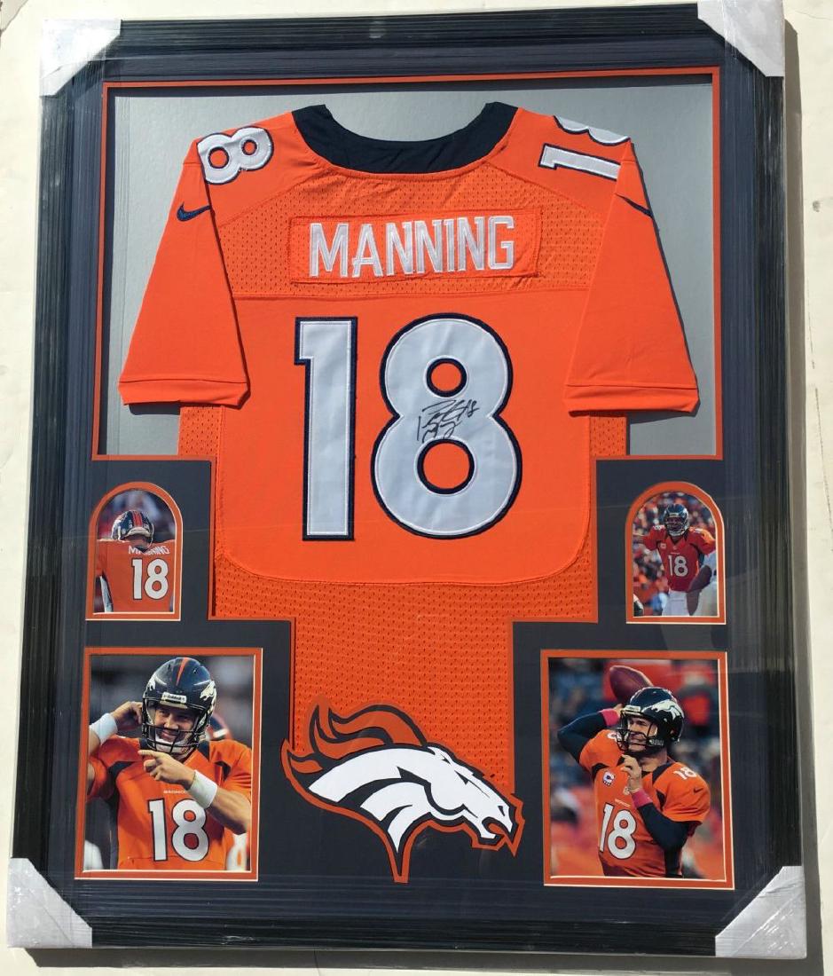 framed manning jersey