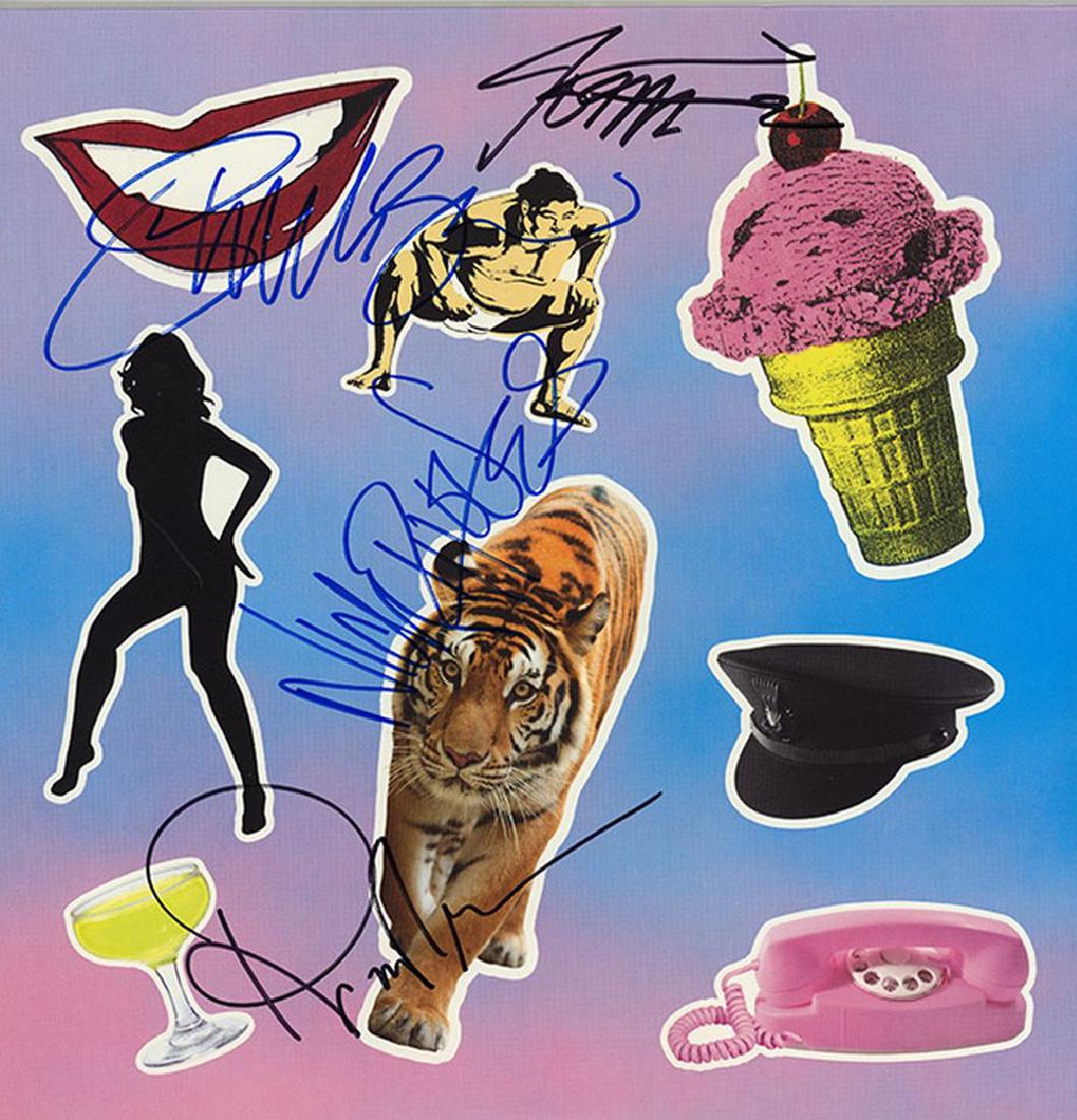 Duran Duran Band Signed Paper Gods Album: Signed by Simon Le Bon, Nick Rhodes, John Taylor, and Roger Taylor