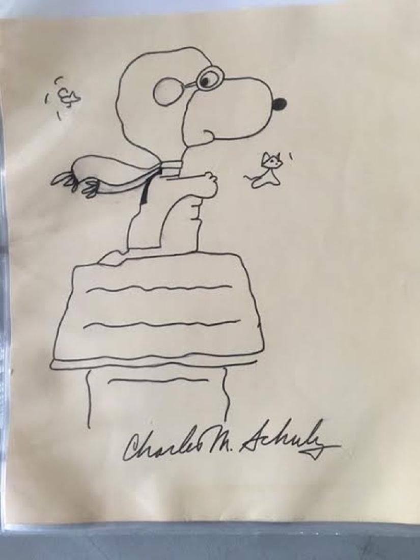 Charles Schulz "Snoopy" Sketch: Signed original sketch of Snoopy dogfighting on his dog house by Charles Schulz