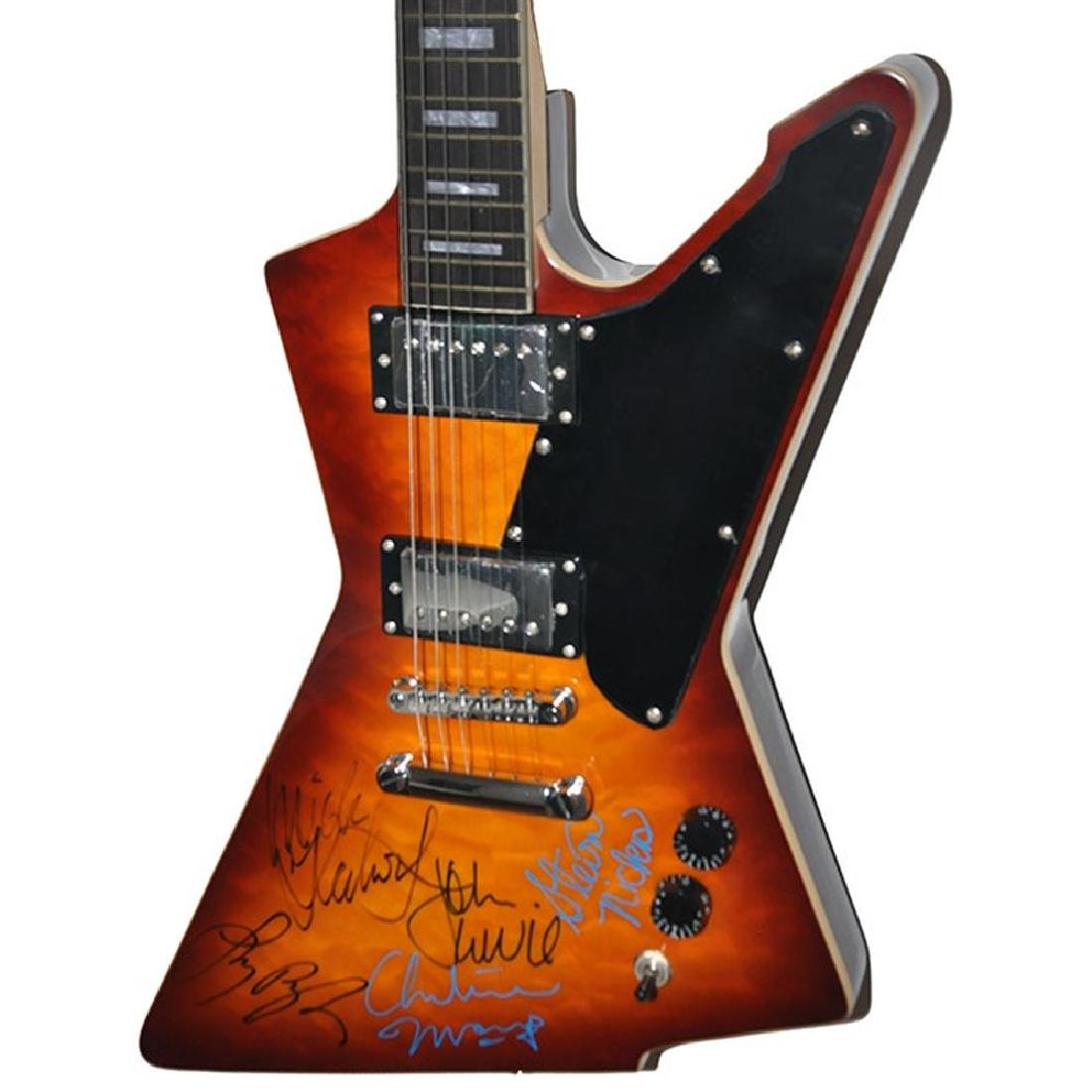 Fleetwood Mac Signed Guitar: Signed by Mick Fleetwood, Stevie Nicks, John McVie, Christine McVie, and Lindsey Buckingham. Approx 42x24x5