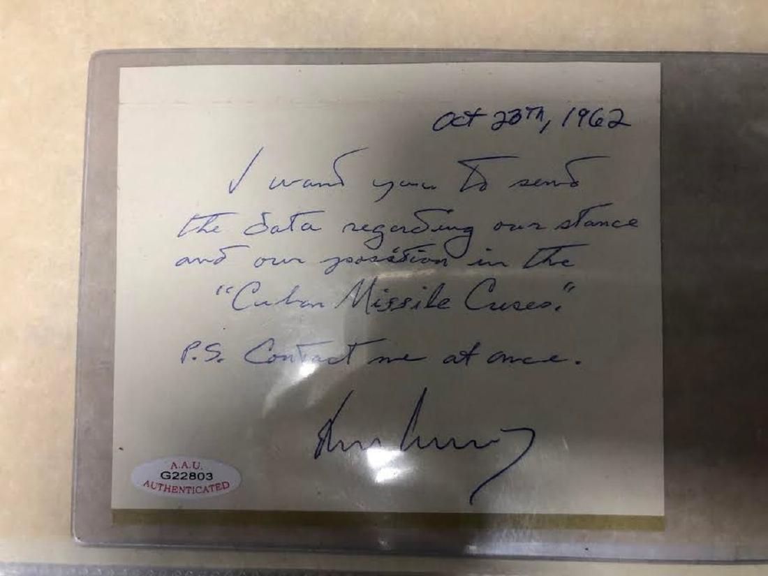 JFK Signed Cuban Missile Crisis Note: Signed and handwritten "I want you to send the data regarding our stance and our position in the "Cuban Missile Crisis." P.S. Contact me at once." by John F. Kennedy. Dated October 23, 1962 Comes with
