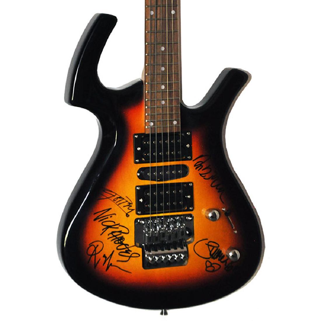 Duran Duran Band Signed Dark Sunburst PS Styled Guitar: Signed by Roger Taylor, Andy Taylor, John Taylor, Simon Le Bone, and Nick Rhodes