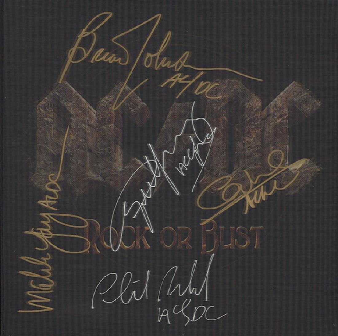AC/DC Signed Rock or Bust Album: Signed by Brian Johnson, Angus Young, Malcolm Young, Cliff Williams, and Phil Rudd