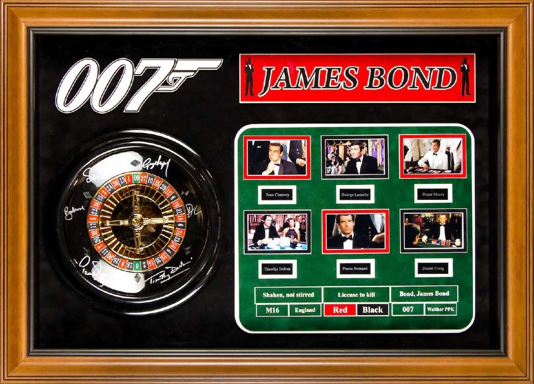 James Bond Autographed Mini Roulette Wheel: Signed by Sean Connery, George Lazenby, Timothy Dalton, Pierce Brosnan, Roger Moore and Daniel Craig