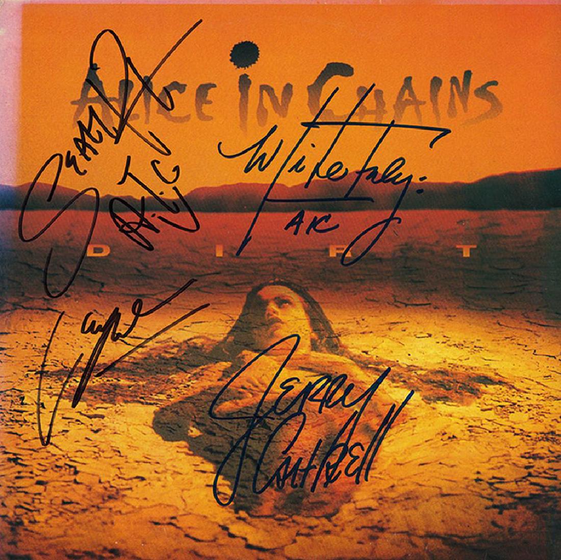 Alice In Chains Band Signed Dirt Album: Signed by Layne Staley, Jerry Cantrell, Sean Kinney, and Mike Inez