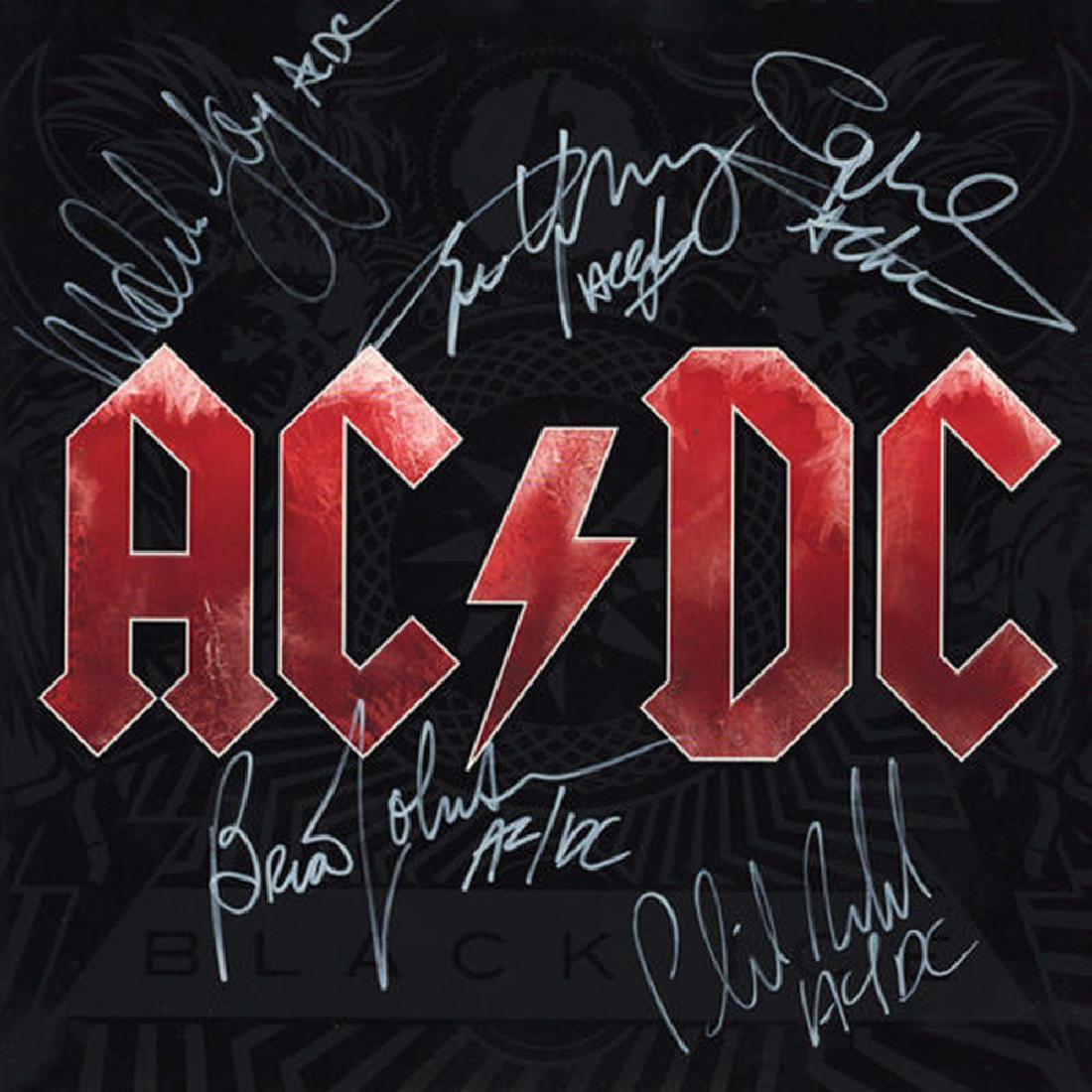 AC/DC "Black Ice" Signed Album: Album signed by Brian Johnson, Angus Young, Malcolm Young, Cliff Williams, and Phil Rudd