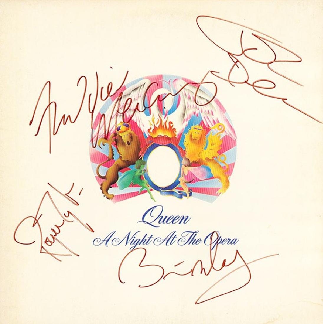 Queen Band Signed Night At The Opera Album: Signed by Freddie Mercury, Brian May, Roger Taylor, and John Deacon. Item will not sell below $490