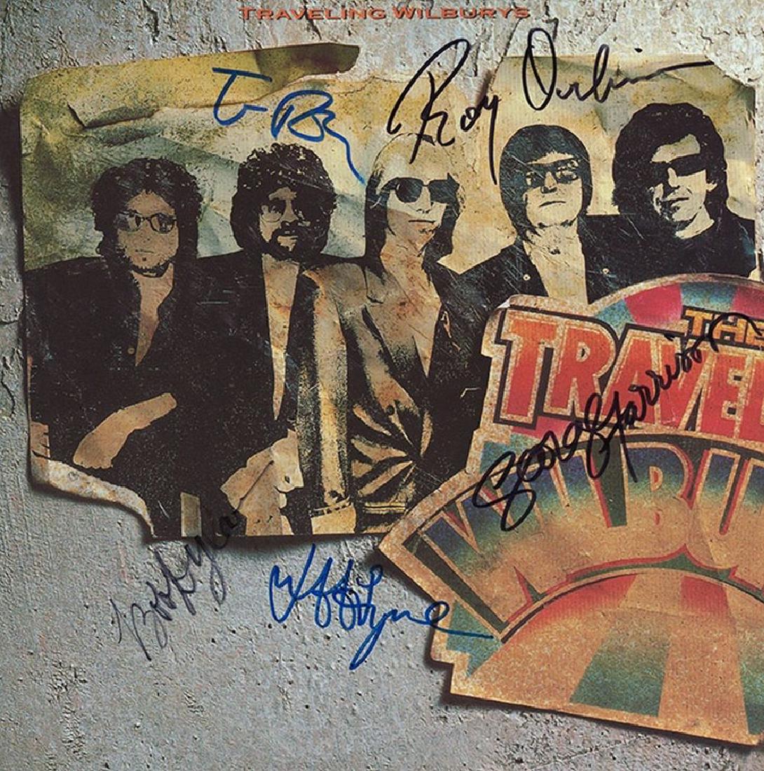 The Traveling Wilburys Band Signed The Traveling: Signed by Bob Dylan, George Harrison, Roy Orbison, Tom Petty, Jeff Lynne. Item will not sell below $725