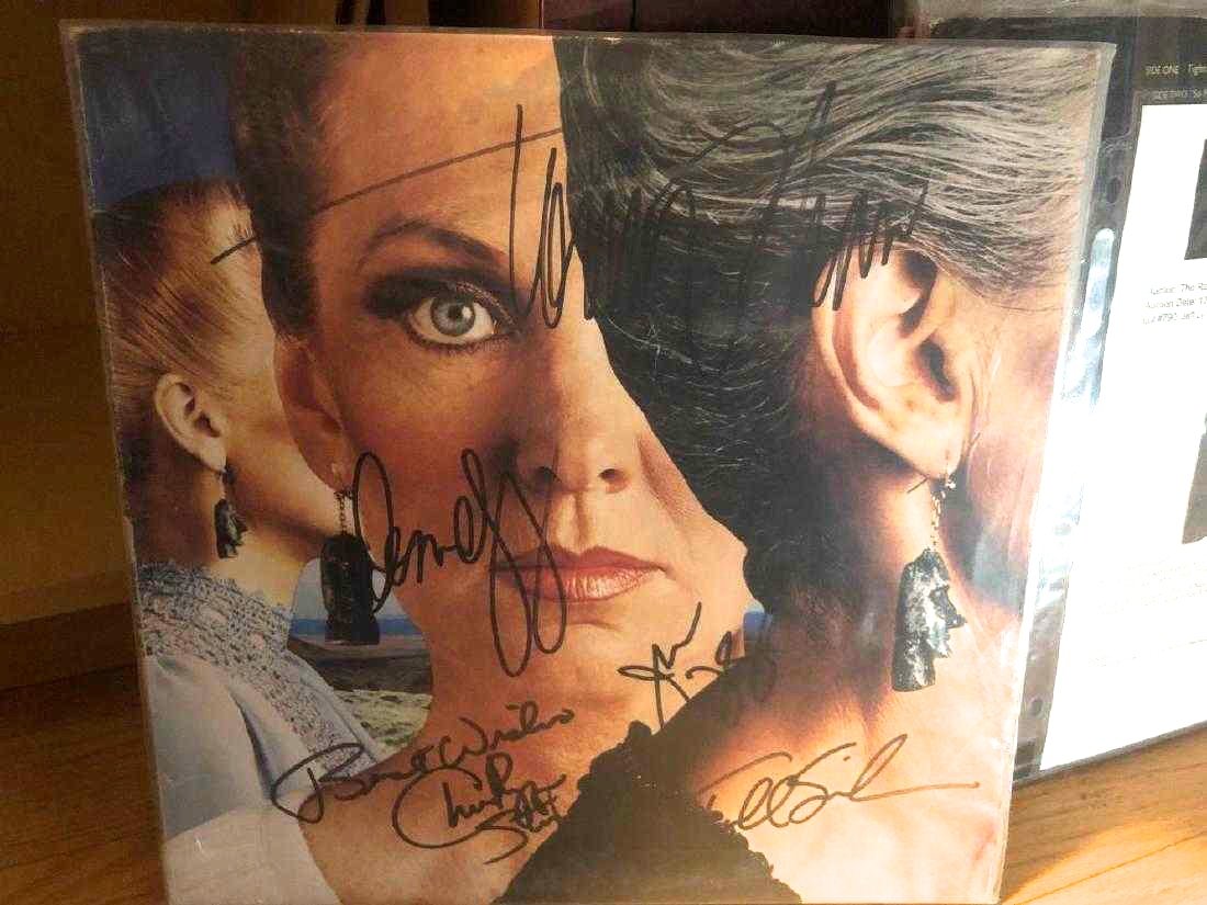 JSA authenticated Styx Signed Album: Signed by C. Ponozzo, T. Shaw, T. Sucherman, J. Young, D. DeYoung. Signatures are located on front of album in black ink. Comes with JSA authentication #B98744. Item is 12x12 and is in great condition
