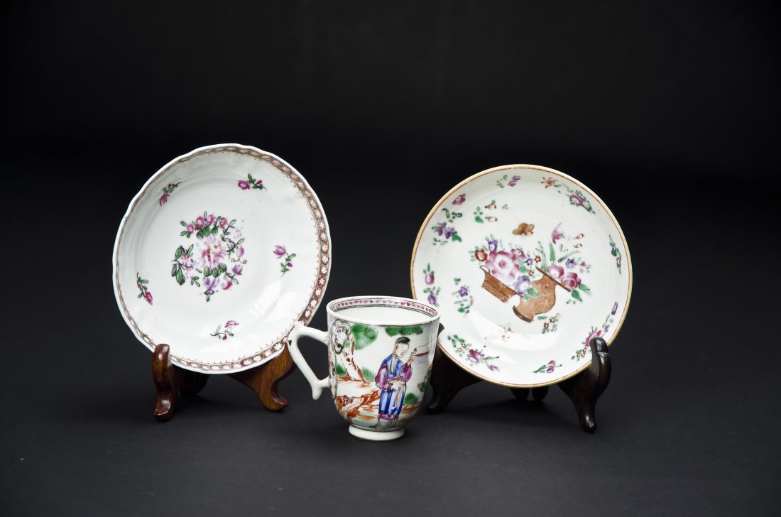 Chinese Export Cup and Saucers 18th Century: 18th Century Chinese famille rose export cup and two saucers. Cup decorated with figure images, the two (disparate) saucers feature floral patterns. Saucers are 5" diameter.