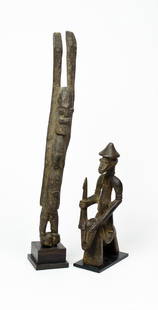 Two Dogon (African) Carved Statues Mali: Lot of 2 carved wood African statues from the Dogon culture of Mali. One features a male figure riding a horse, wearing a conical hat. The other is of a figure with hands held up to the sky. Both exce