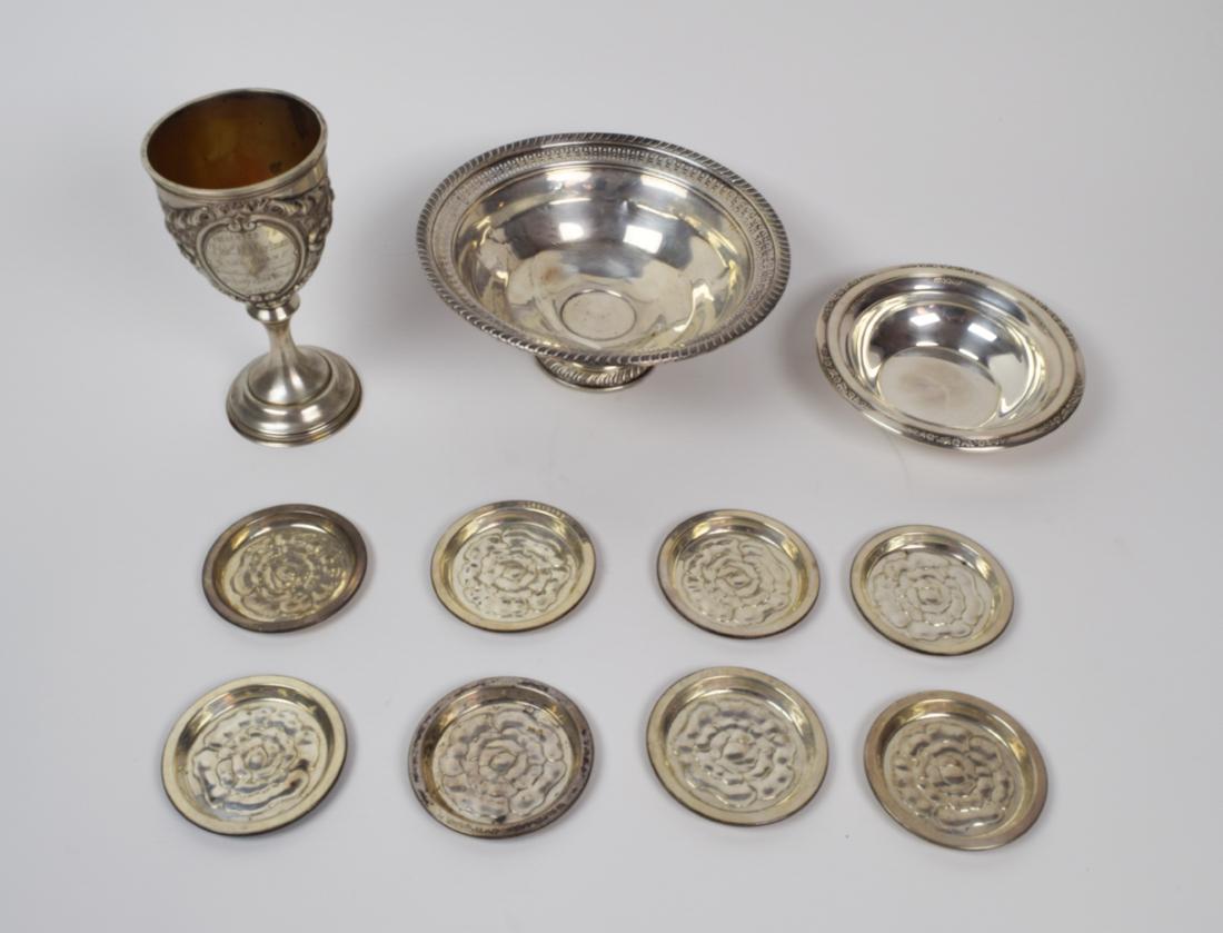 Sterling Silver Objects Chalice, Bowl and Coasters: Sterling lot consisting of a presentation chalice marked "W & H Sterling 4", footed bowl marked "S Sterling Cement Filled Reinforced", low bowl marked "Courtship International Sterling B197" and eight