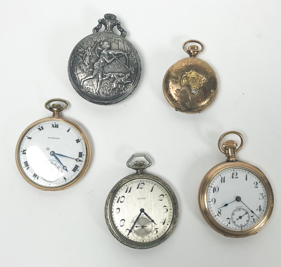 5 Pocket Watches - Howard, Liberty, Elgin, Lion Watch: A Grouping of 5 Early 20th Century pocket Watches E. Howard Watch Company (Keystone Case). White face with Roman Numerals marked "Howard". Some chips and scratches to porcelain. Serial Number 1252262