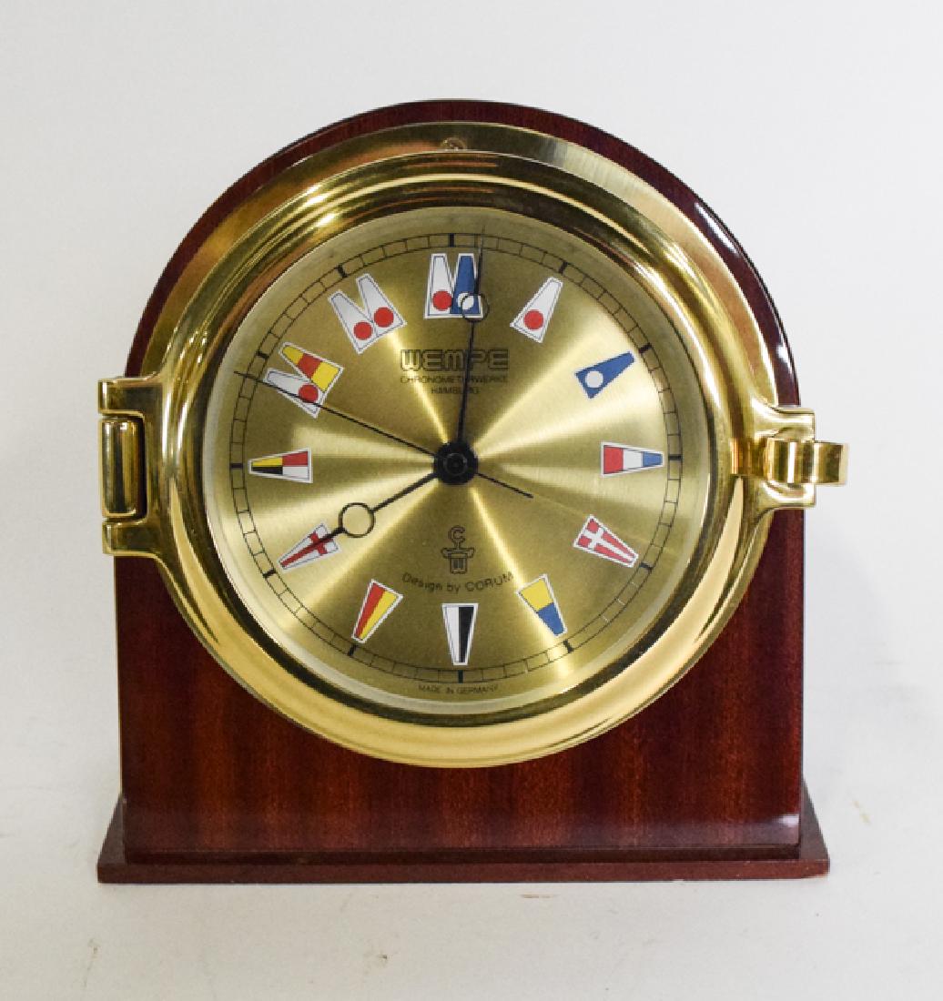 Wempe Desk Chronometer Clock: Wempe Desk Chronometer (Clock)face marked "Wempe Chronometer Hamburg Made in Germany" and features 12 nautical flags 7" x 6" x 2".
