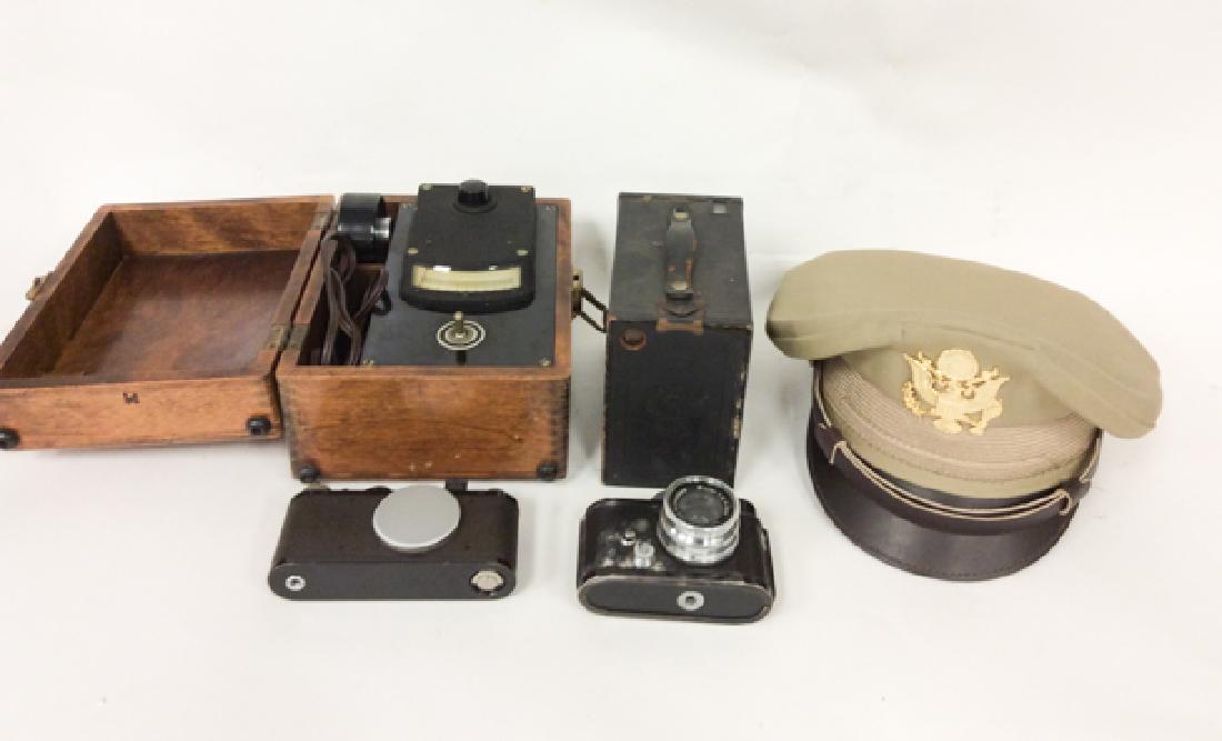 Leica Camera, Robot Camera, Brownie Camera and Military: 5pcs, 3 older cameras, American Military hat, meter, etcLuftwaffen-Robot camera no.F 38266-5, engraved 'Luftwaffen-Eigentum' on rear, WithCarl Zeiss Jena Nr. 2440449 Biotar 1:2 f=4cm lens.Leica Standa