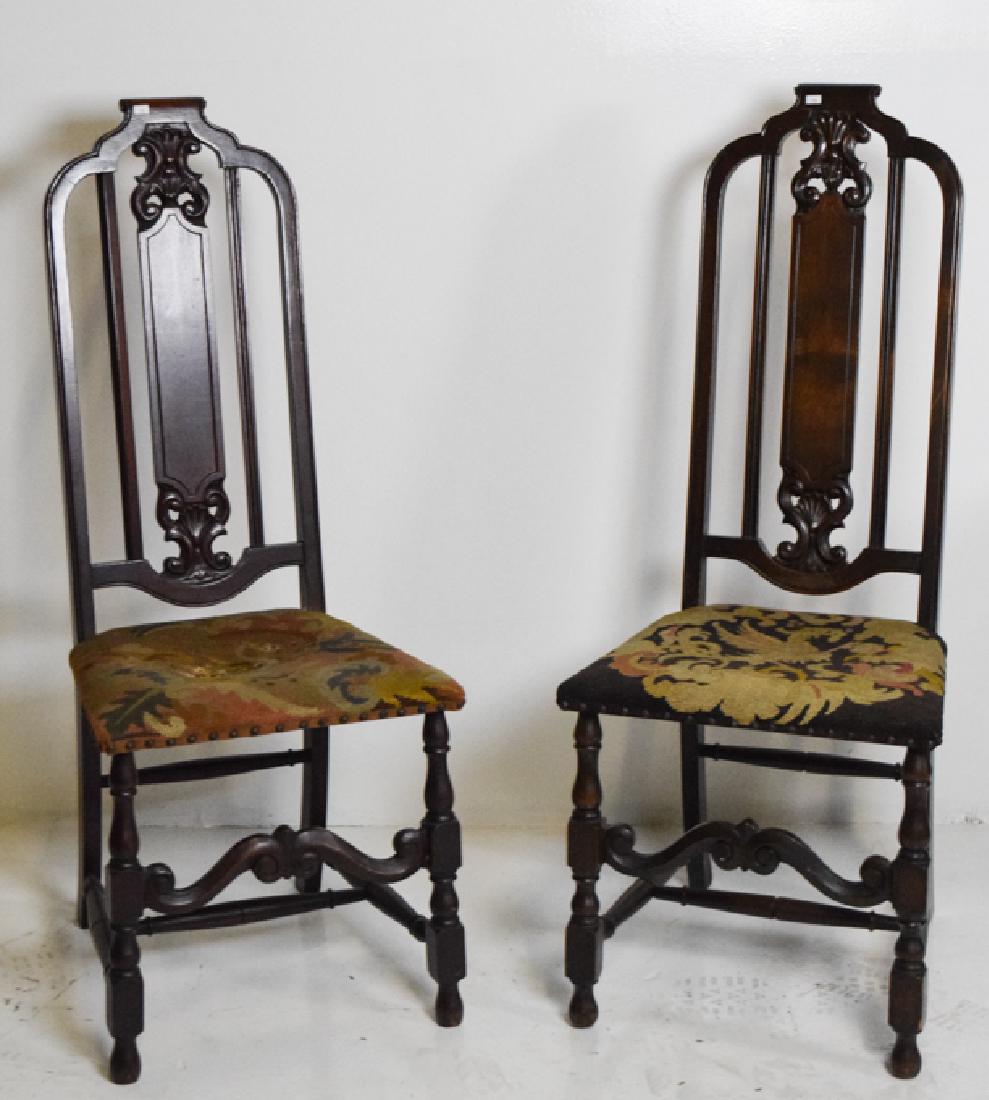 Pair Mahogany Carved Chairs with Needlepoint: 46"H x 18"L x 17"W , seat on one chair ripped