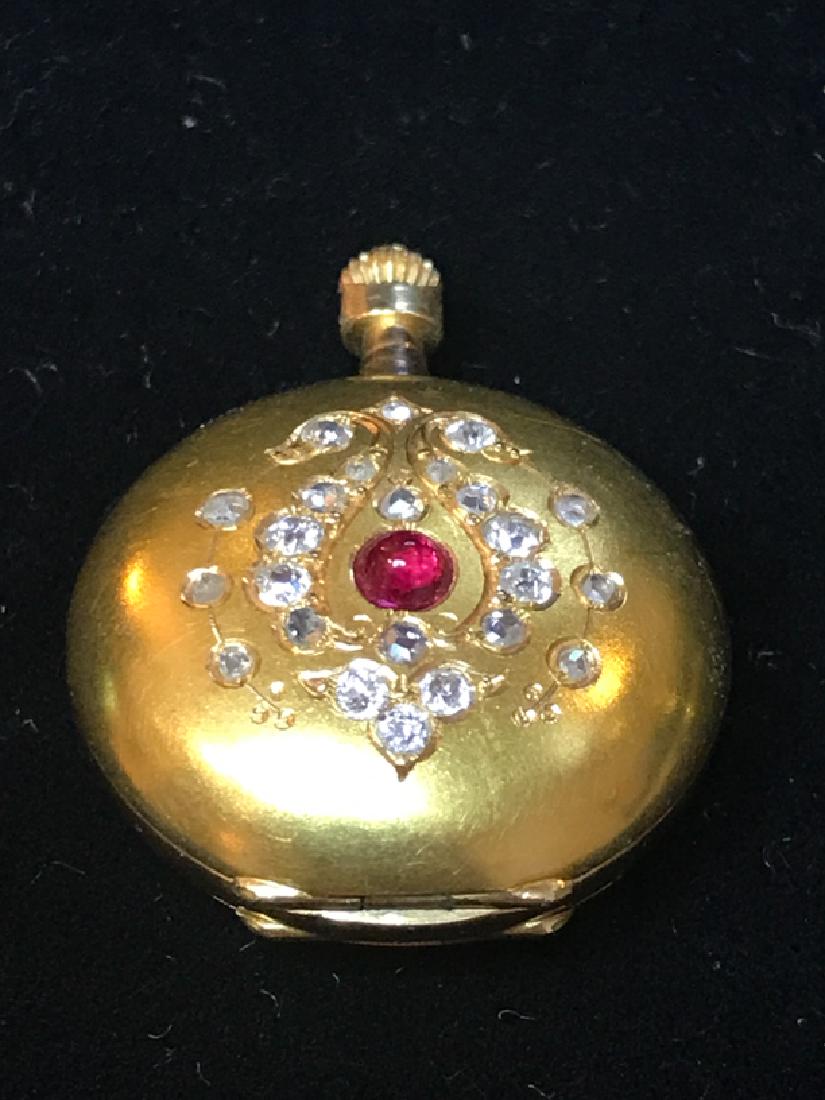 Ladies 18k Karat Gold, Diamond and Ruby Pocket Watch: Circa 1880. Tall cabochon ruby 0.20ct (by formula), 24 Old Rose and European cut diamonds 1cttw (estimate), J-L Cape, VS-SI clarity, full hunting case marked #6026, K18, Swiss, free movement not teste