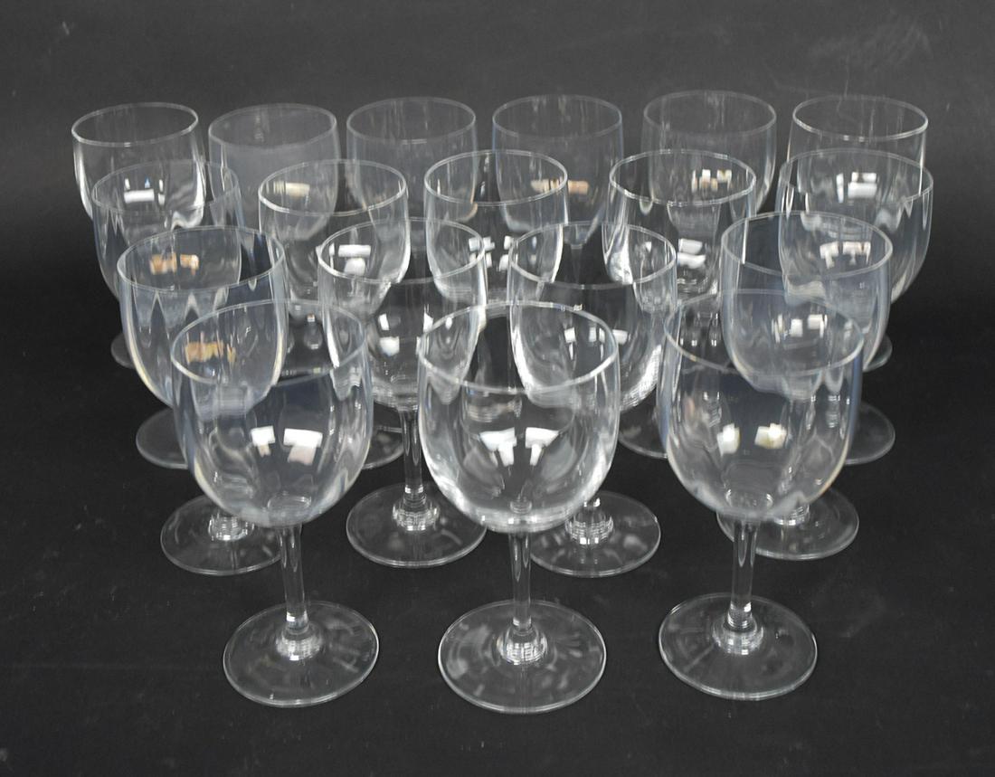 18 Baccarat White Wine Stems: Some small nicks to some edges. Marked on bottom. Height 5.75"