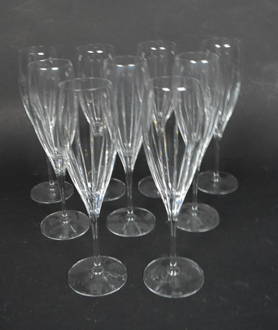9 Christofle Champagne Flutes: Ribbed sides. Marked on bottom. Height 8.5"