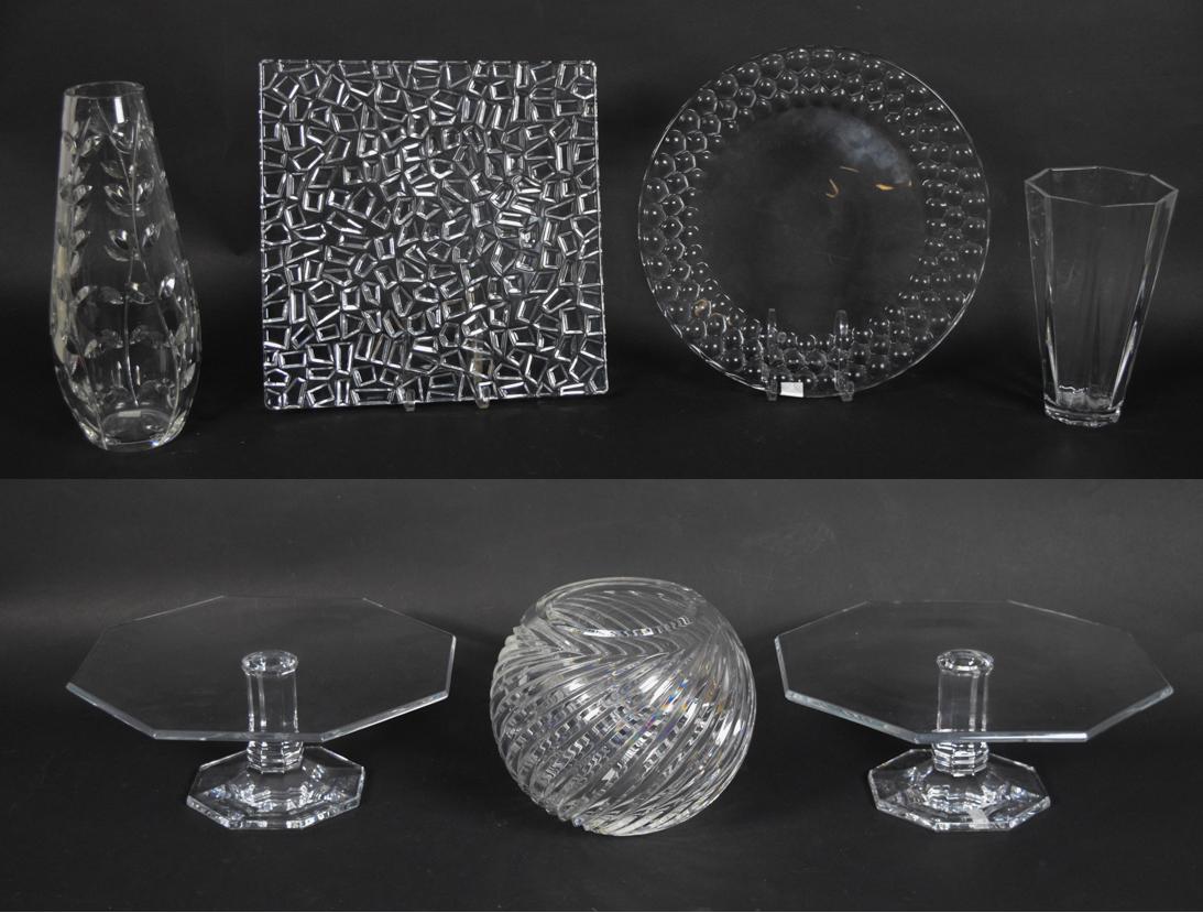 Group of Tiffany and Co Crystal: Pair of Tiffany and Co cake plates, square modern serving platter, round modern serving platter, vase with floral motif, tall vase, low vase. Floral vase height 12"