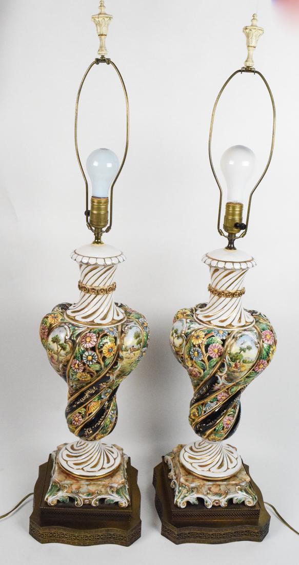 Pair of Capodimonte Style Porcelain Lamps: Bulbous form with scenes of 18th century men and women. Height 40"