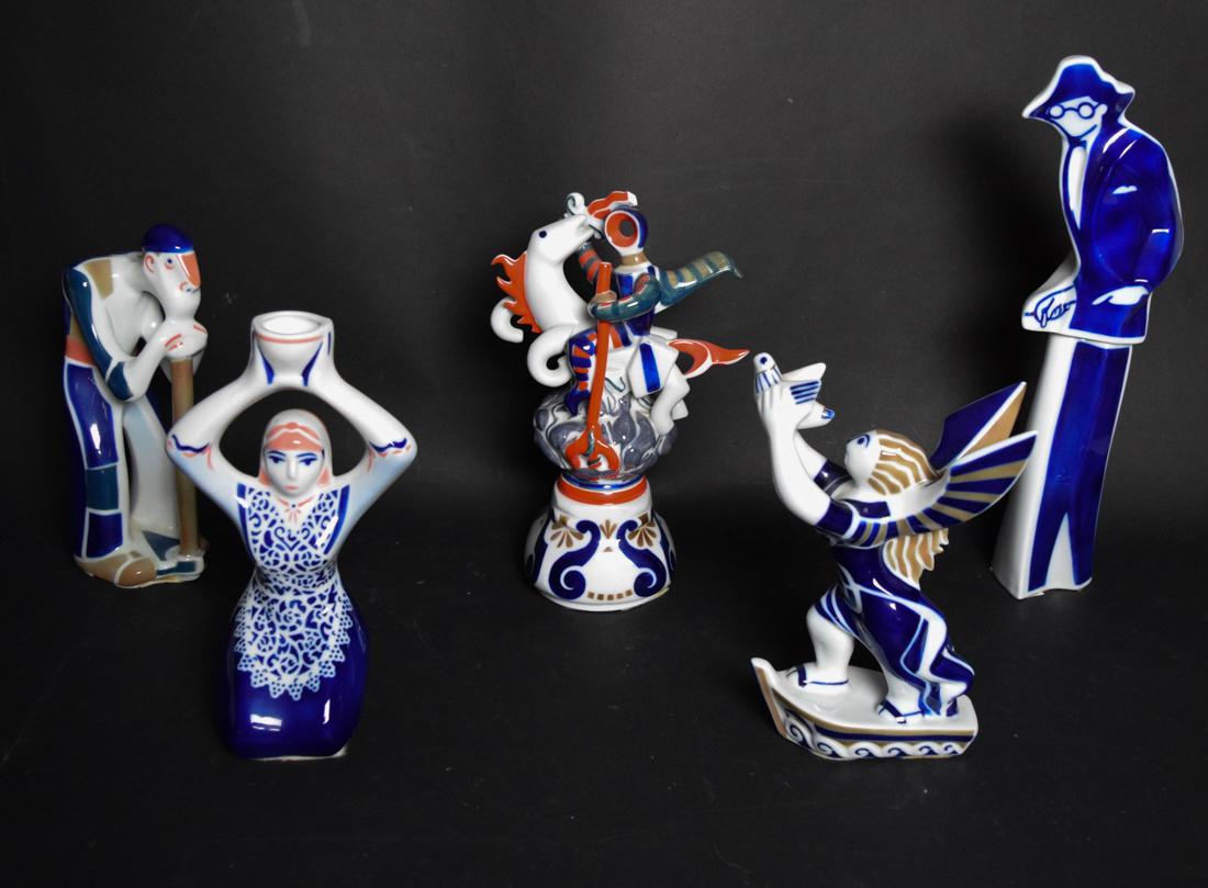 Sargardelos Sculptures: Group of 5 Sargardelos sculptures, in blue and white porcelain: 1 statue of Fernando Pessoa, an old man with a cane, St. Jordi and the Dragon, one piece sculpture, and a woman in traditional costume c