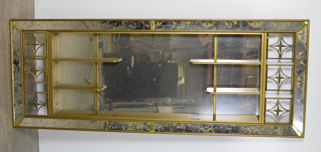 Mid Century Modern Hanging Wall Vitrine: Googie architectual style. Mirrored back and frame with six star cut outs flanking four shelves 68" H x 26" L x 4.5" W
