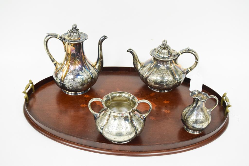 19th Century Silver Plate Tea Set & Wooden Tray: Four piece silver plate tea set. Associated marquetry wooden tray with brass handles. Tray 26" Wide, coffee pot 9 1/2" Tall