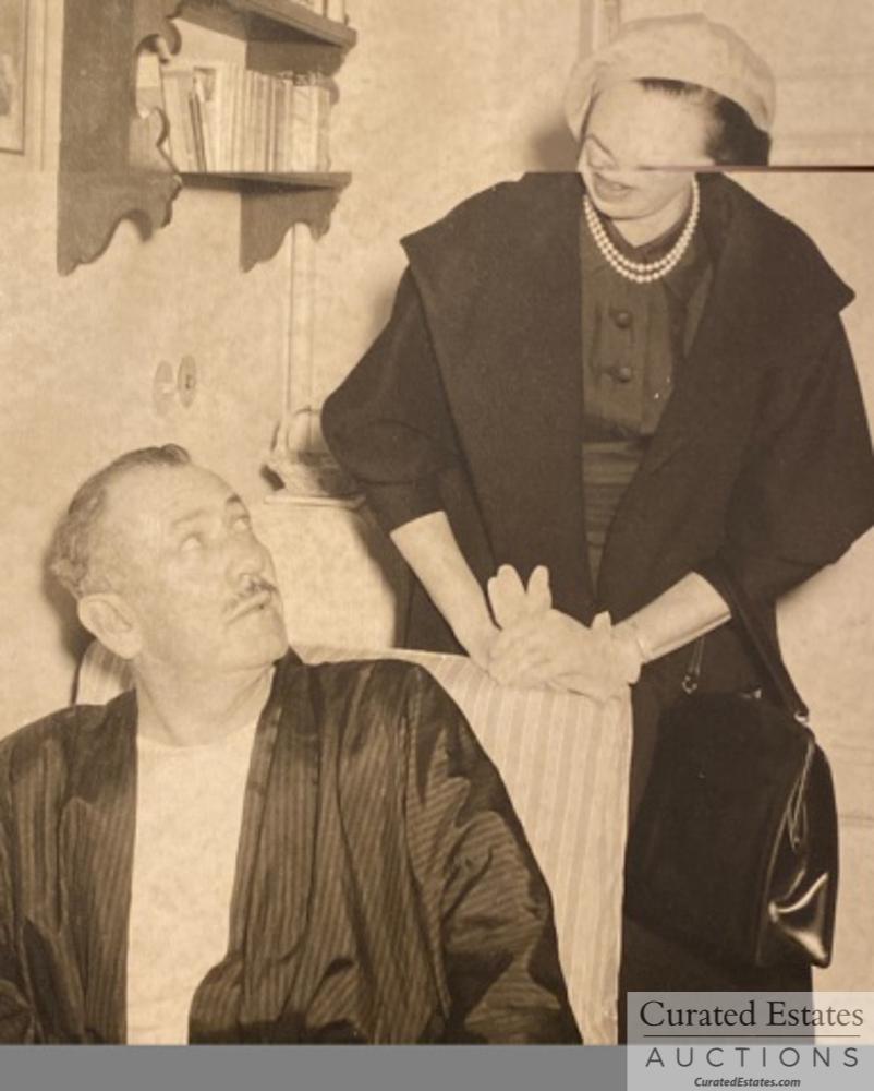 Photo of John and Elaine Steinbeck Italy 1953: Black and White Photo of John and Elaine Steinbeck in Florence, Italy at Beacci Pensione in 1953. Verso says: Foto Levi, via P.S. Maria, 15 Rosso Tel. 294.002 - Firenze Provenance: The Estate of John 