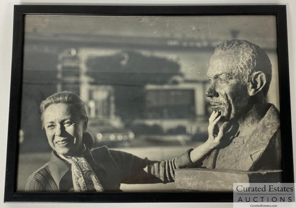Framed Photo of Elaine Steinbeck 1969: Framed Photo of Elaine Steinbeck in Monterey California with Steinbeck bust in 1969 12.75" x 8.75" - May be a John Bryson photo. Provenance: From the Estate of Elaine Steinbeck