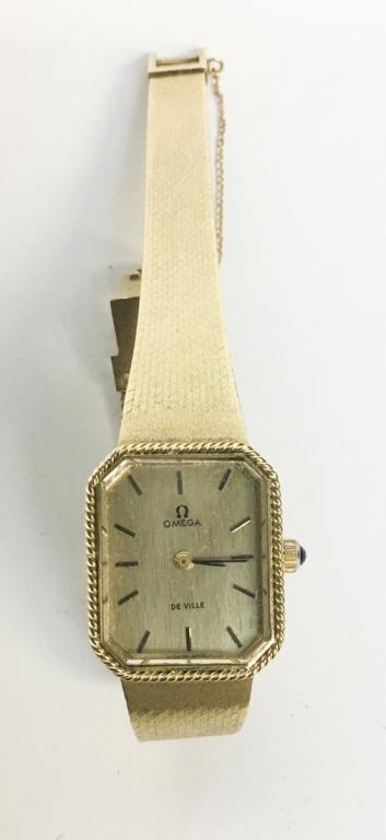 Omega De Ville Women: Omega De Ville Women's Watch. Works marked "UNADJUSTED SEVENTEEN 17 JEWELS 625 OMEGA SWISS" Marked 18K on inside of cover. 42.9 grams without works.