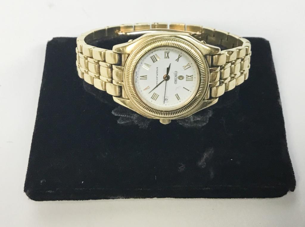 14K Gold Concord Steeplechase Women Watch: Concord Steeplechase Women's watch. Marked "750 cwc F61" on band. Marked "50 36 260 967723" on back. , Italy 750. 42 grams