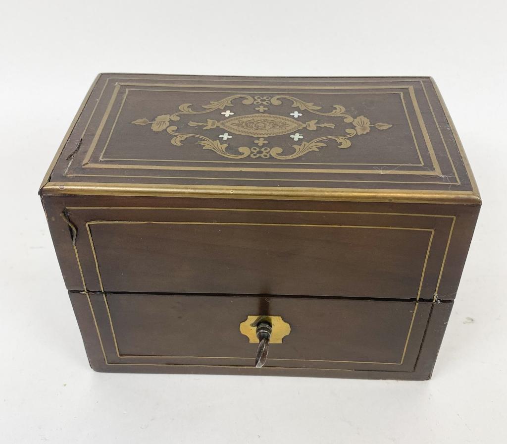 Napoleon III Scent Bottle Casket: Naopleon III wooden scent bottle casket with brass & mother of pearl inlays, with three crystal scent bottles with stoppers and hand painted decoration. Missing some brass inlay. 4"H x 5 1/2"W