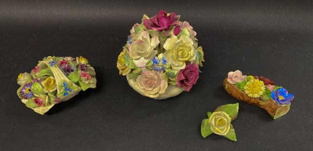 Porcelain Flower Groups: 4 porcelain flower groups. 3 English bone china including Coalport and Denton, some small chips, and a Herend flower. Largest flower group 6 1/2"H