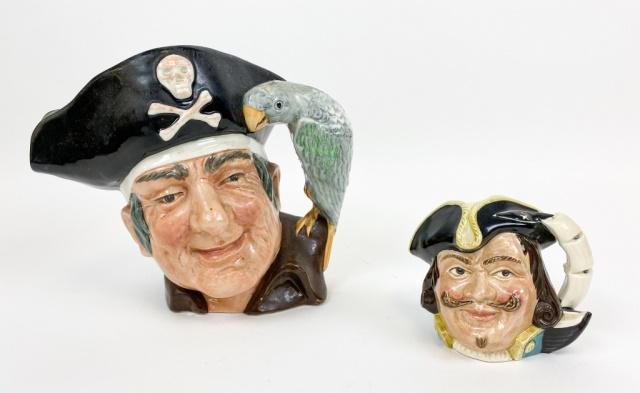 Two Royal Doulton Character Jugs: 2 Royal Doulton porcelain character jugs. Long John Silver, 6 1/2"H and Captain Henry Morgan, 3"H