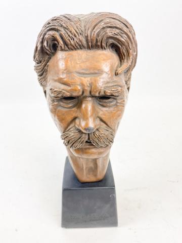 Bust of Albert Schweitzer by Leo Cherne: Bronze finished bust head Albert Schweitzer, signed Leo Cherne 1955. 13 1/2"H. Missing finish on left ear.
