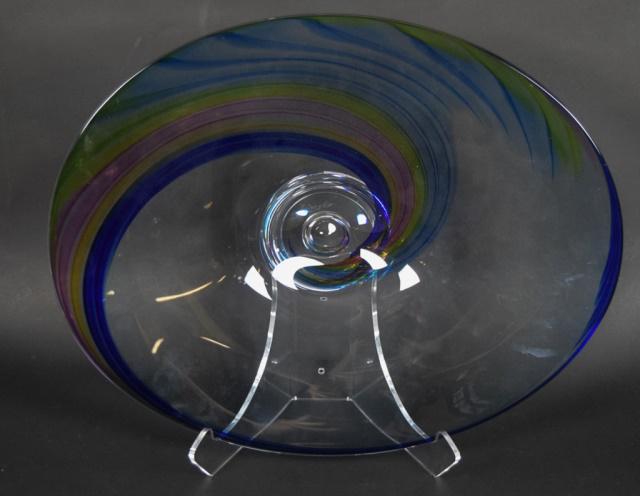 Kosta Boda Hand Blown Center Bowl: Goran Warff (Sweden 1933-) for Kosta Boda. Multicolor swirl in clear glass. Diameter 22"