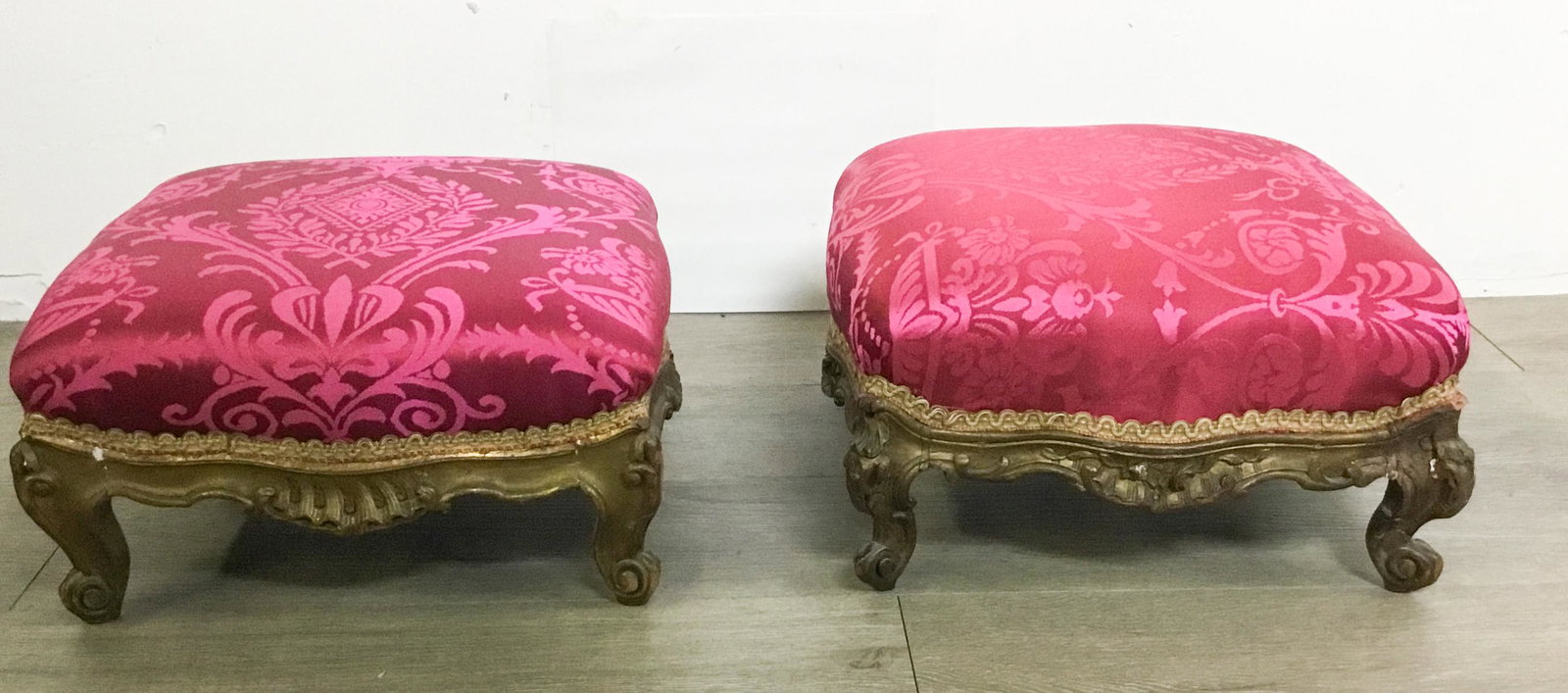 Pair of French 18th Century Red Tufted Footstools: 18th century French Louis XV giltwood stools ( one may be early 19th century) 6"H x 13"L x 13"W