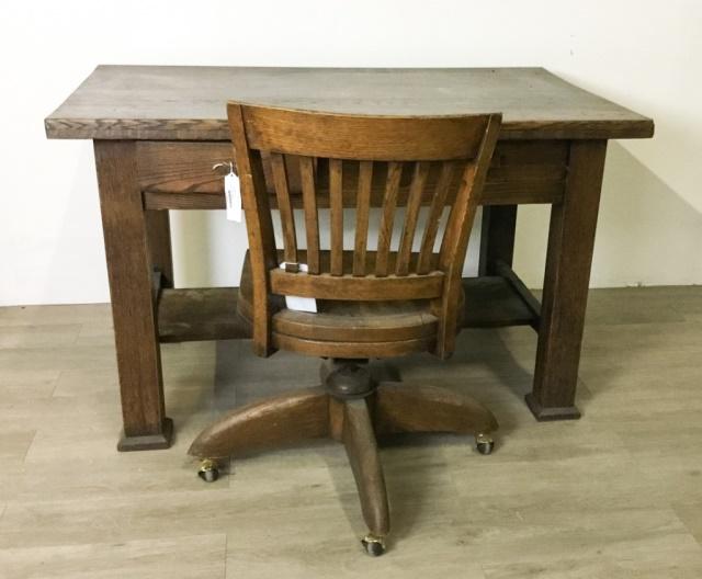 Paine Arts & Crafts Desk & Gunlocke Chair: Early 20th Century. Quarter sawn oak. Paine Furniture Co. desk 29"H x 48"L x 30"W; Gunlocke chair 32 1/2"H