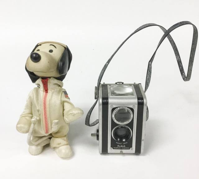 Snoopy Astronaut, Kodak Duaflex Camera: Snoopy, one arm detached, tail detached, bottom of pants torn. Camera 4 1/4"H