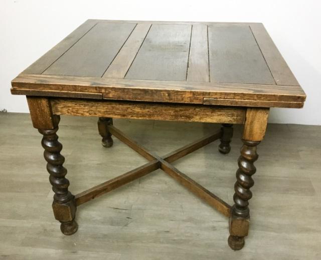 Pub Table With Two Pull-Out Leaves: On barley twist legs with "X" supporting stretcher. 35 3/4"L x 35 3/4"W x 30"H (closed)