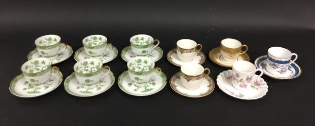 Grouping of Limoges Demitasse Cups & Saucers: 11 cups & saucers including a set of 6 Haviland Bonneval, Haviland Julia, Wm. Guerin & Co., pair of Vignaud, La Seynie (flake on saucer).