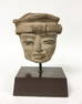 Clay Head on Wooden Base