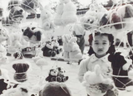 Black and White Photo of girl in China by Silver: Black and White Photo of girl in Yangzlou, China by Larry Silver Frame: 20" x 24" Sight Size: 16"x20"